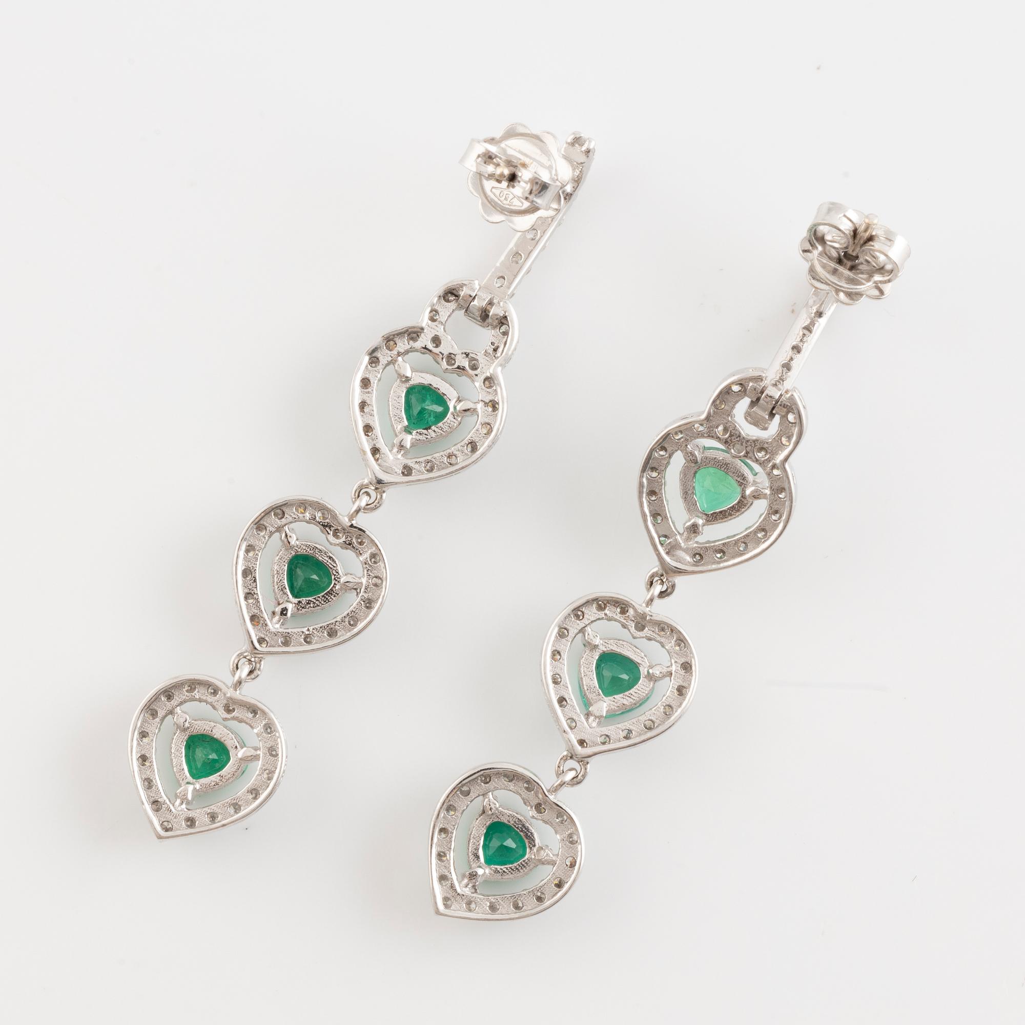 Emerald and brilliant cut diamond earrings.