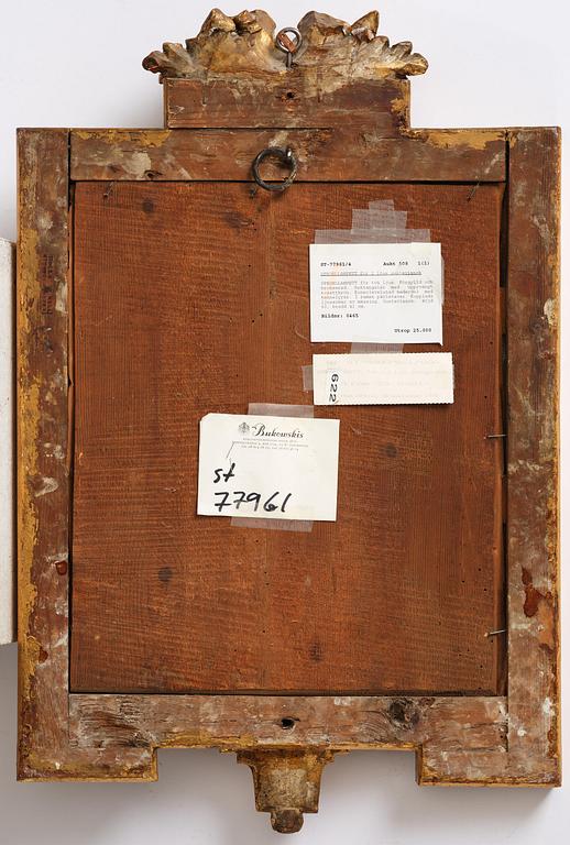 A Gustavian giltwood two-light girandole mirror by J. Åkerblad (master in Stockholm 1754-99).