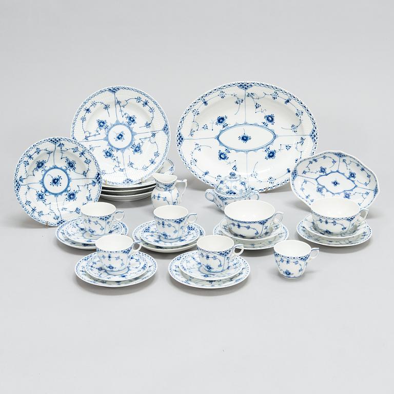 A set of 21 pieces Royal Copenhagen Blue Fluted Half-lace porcelain.