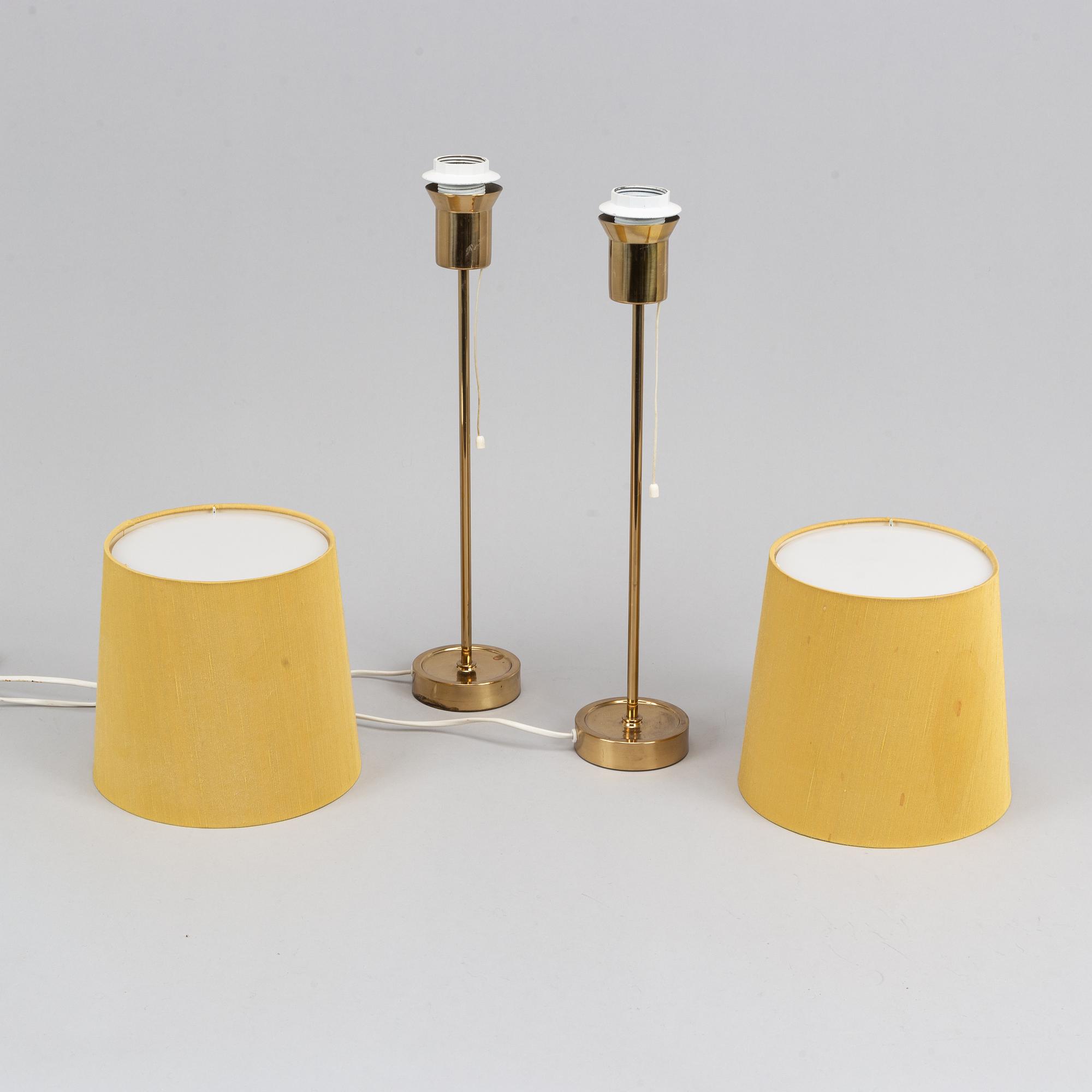 Apair of Bergbom brass table lamps.