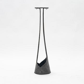 A cast iron pedestal, 20th century.