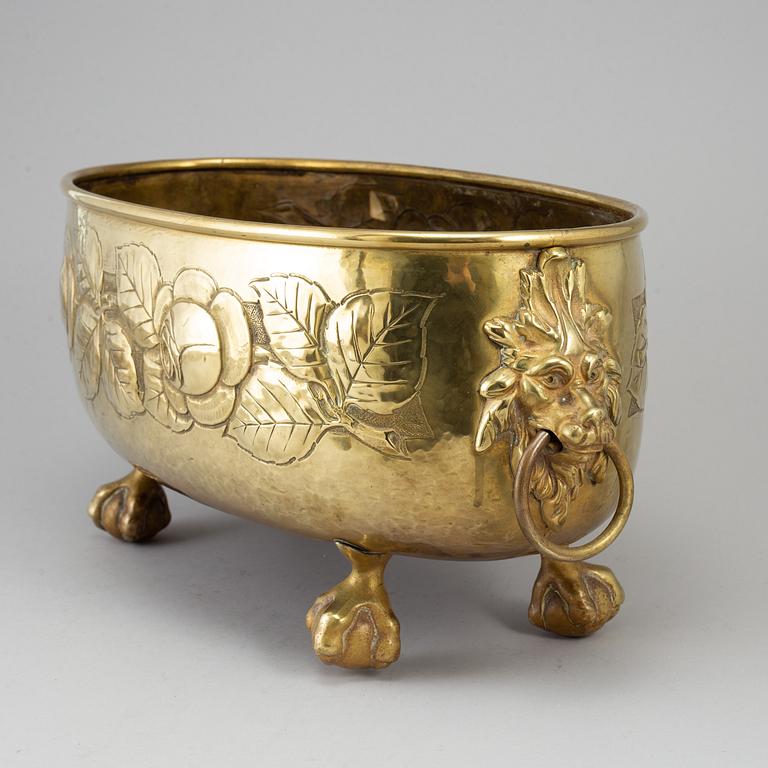 A 19th century brass flower pot.