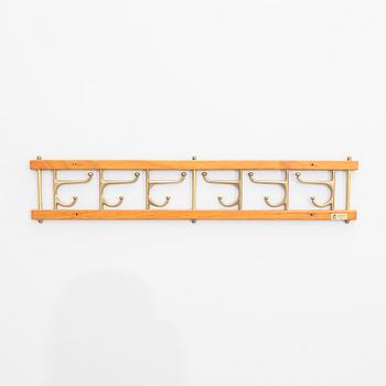 Klädhängare, "Dekorativ", Skoglunds metallgjuteri, Anderstorp, 1950/60-tal.