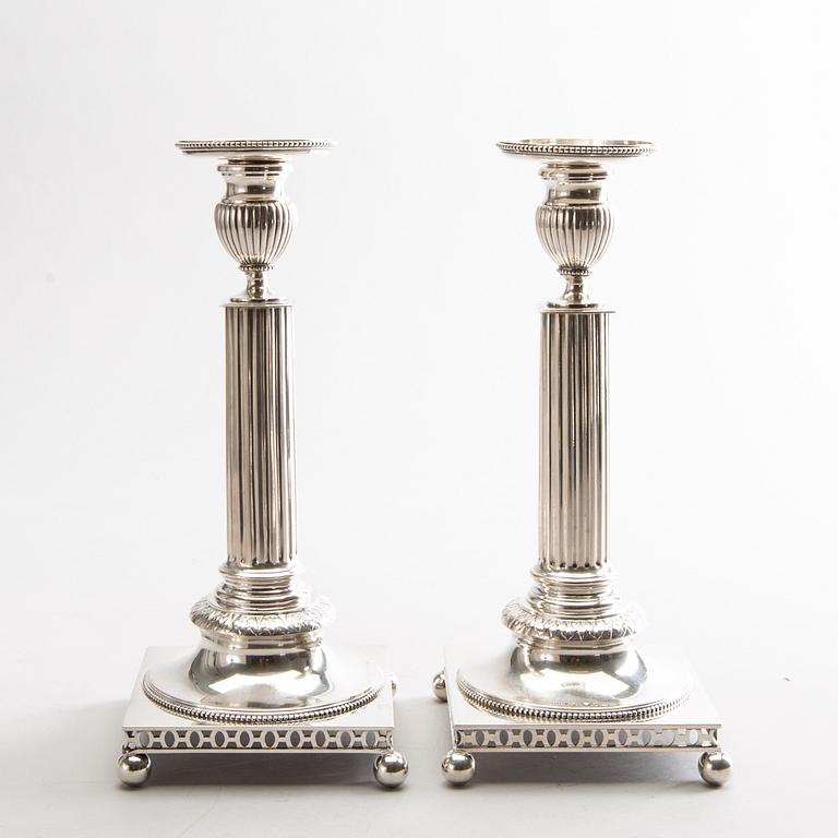GUSTAF MÖLLENBORG, a pair of silver candlesticks 1902-1903 Stockholm.
