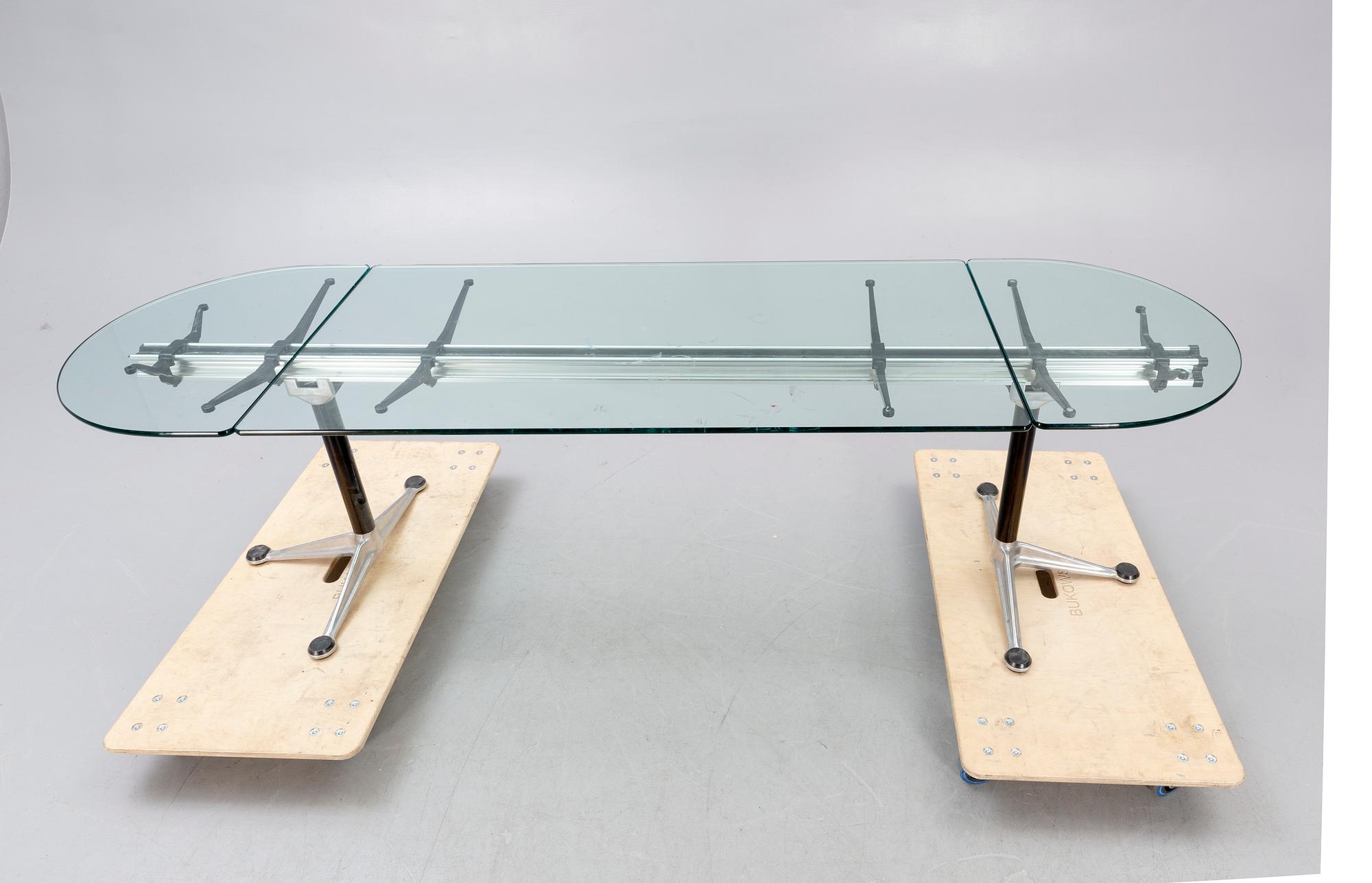 A Bruce Burdick 1980s glass and metall table for Herman Miller/Burdicks groups.
