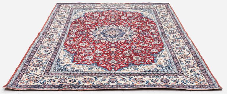 A semi-antique Isfahan rug, Central Persia, signed (Sadegh) Seirafian, c. 237 x 146 cm.