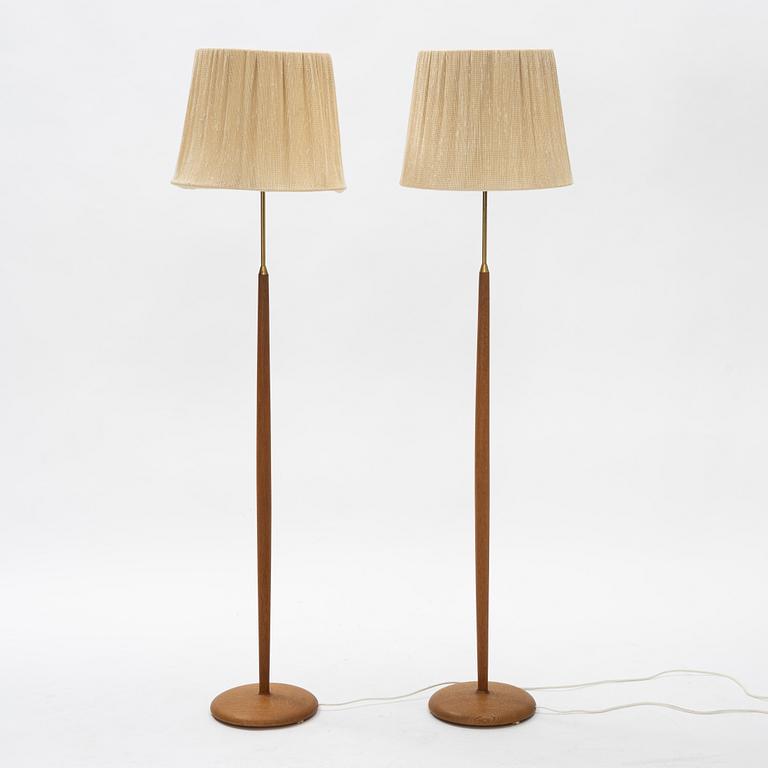 A pair of teak floor lamps, Falkenbergs belysning second half of the 20th century.