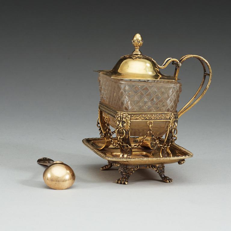 A Swedish 19th century silver-gilt and glas mustard-jug, makers mark of Gustaf Folcker, Stockholm 1835.