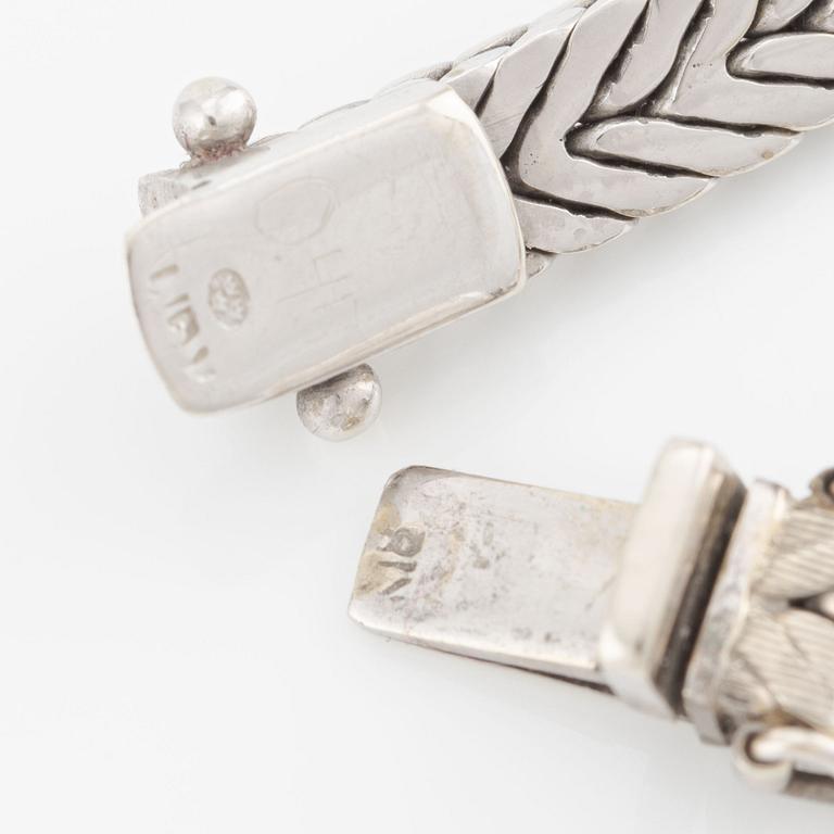 Armband, 18K guld och vitguld med briljantslipade diamanter.