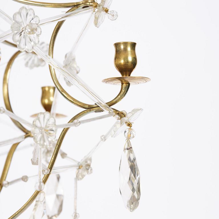A seven-light gilt brass and cut glass rococo chandelier, mid 18th century.