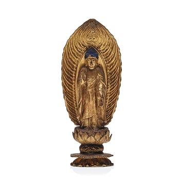 A miniature lacquer Buddha, Tibet/Nepal.