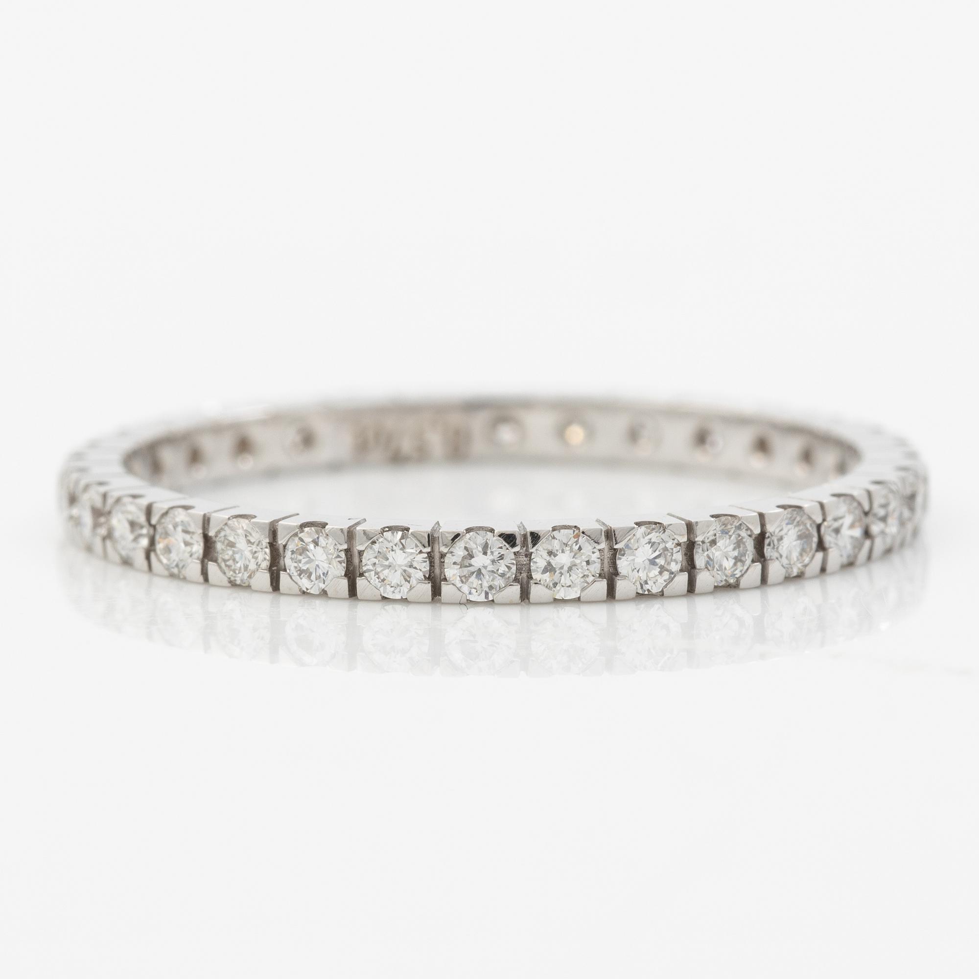 Ring, full eternity, 18K white gold with brilliant-cut diamonds.