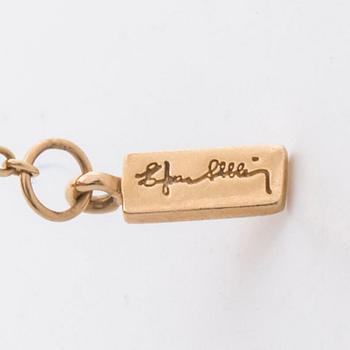 EFVA ATTLING, ARMBAND 18K guld m briljanter 0,12 ct enligt gravyr.