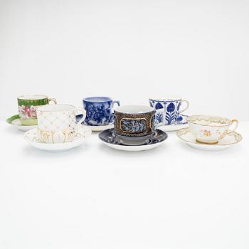 A set of 12 pair of porcelain mustache cups, including Germany, 19th and 20th century.