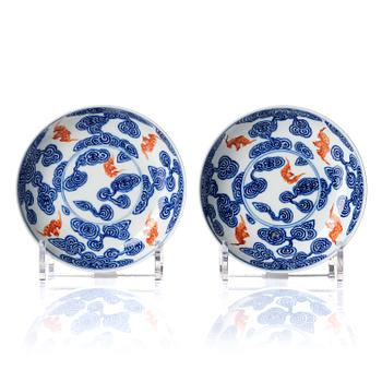 A pair of underglaze blue and and iron-red 'wufu' dishes, Qing dynasty with Guangxu mark and of the period (1875-1908).