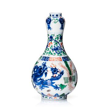 1032. A doucai vase, late Qing dynasty with a Jiajing mark.