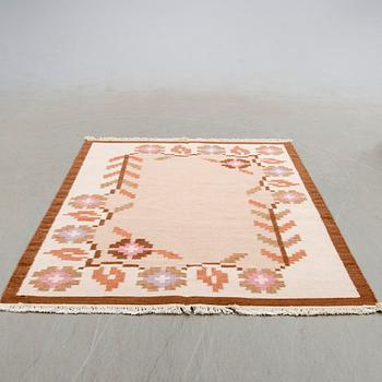 Matta rölakan ca 235x165 cm.