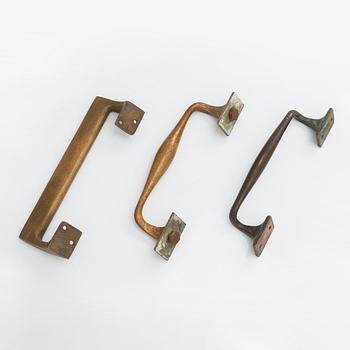 Door handles, three pieces, ca 1900 and 1960s.