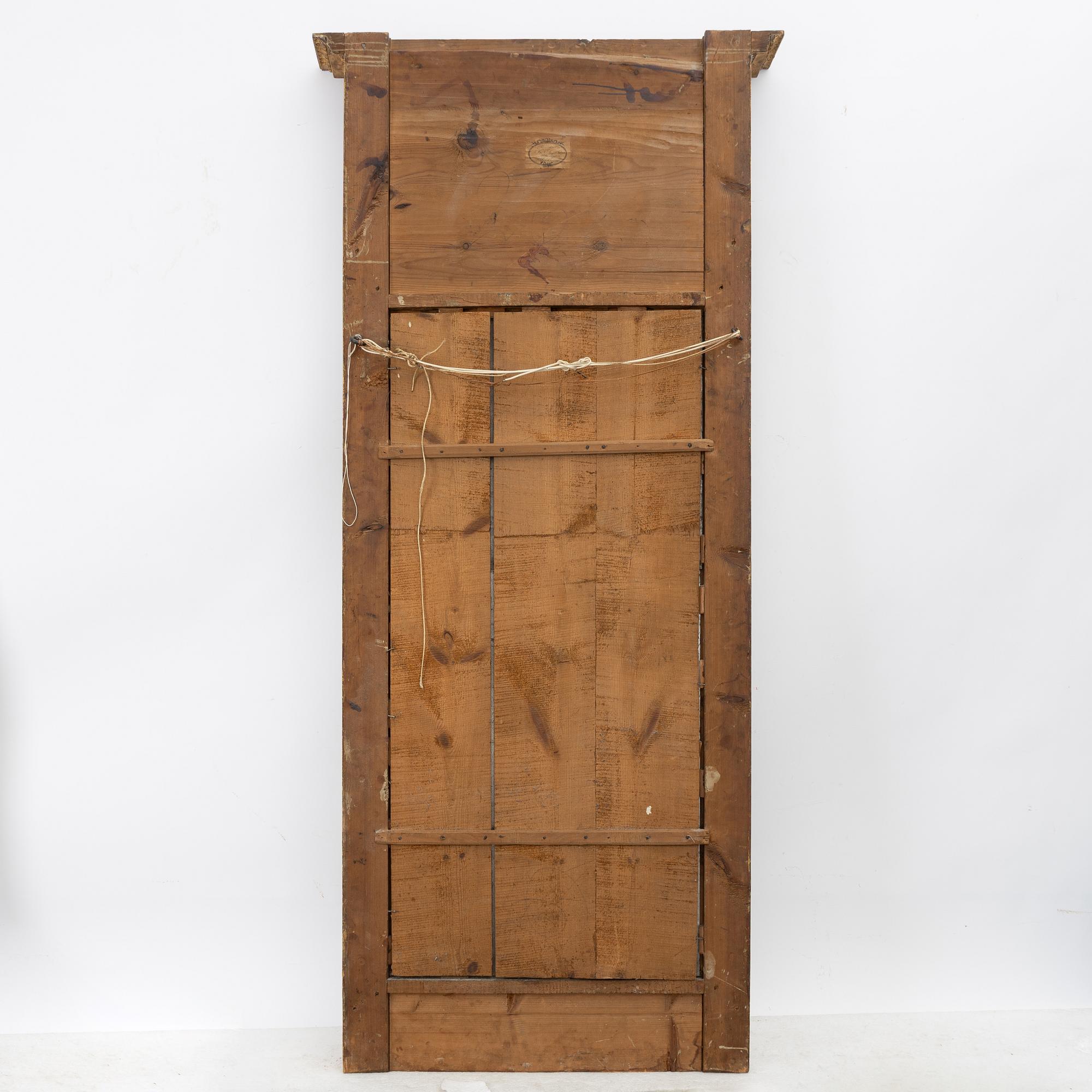 Empire, A late Empire mirror, first half of the 19th century.