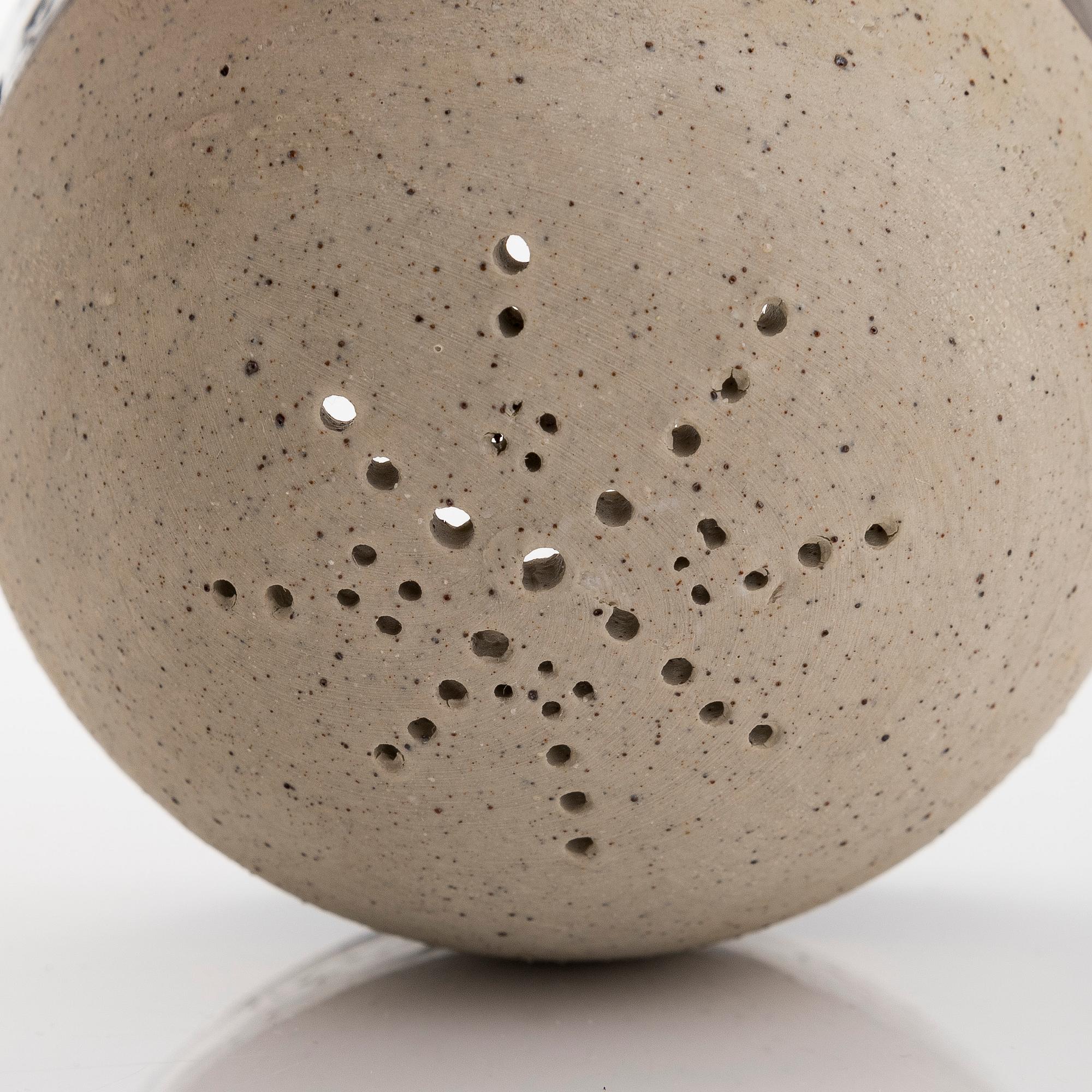 Kyllikki Salmenhaara, a stoneware tea strainer signed KS.