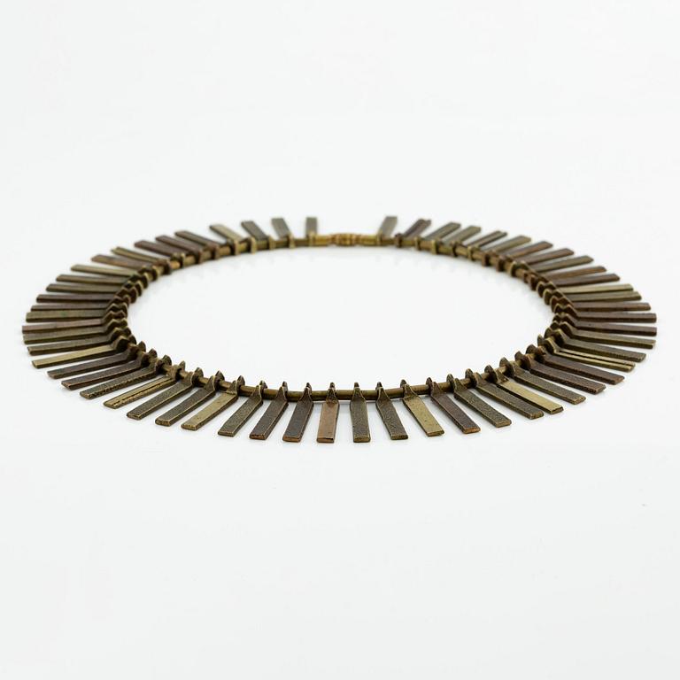 Inga-Britt "Ibe" Dahlquist, a necklace, bronze, "Nefertiti".