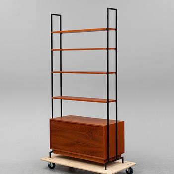 A teak shelf and drawers.