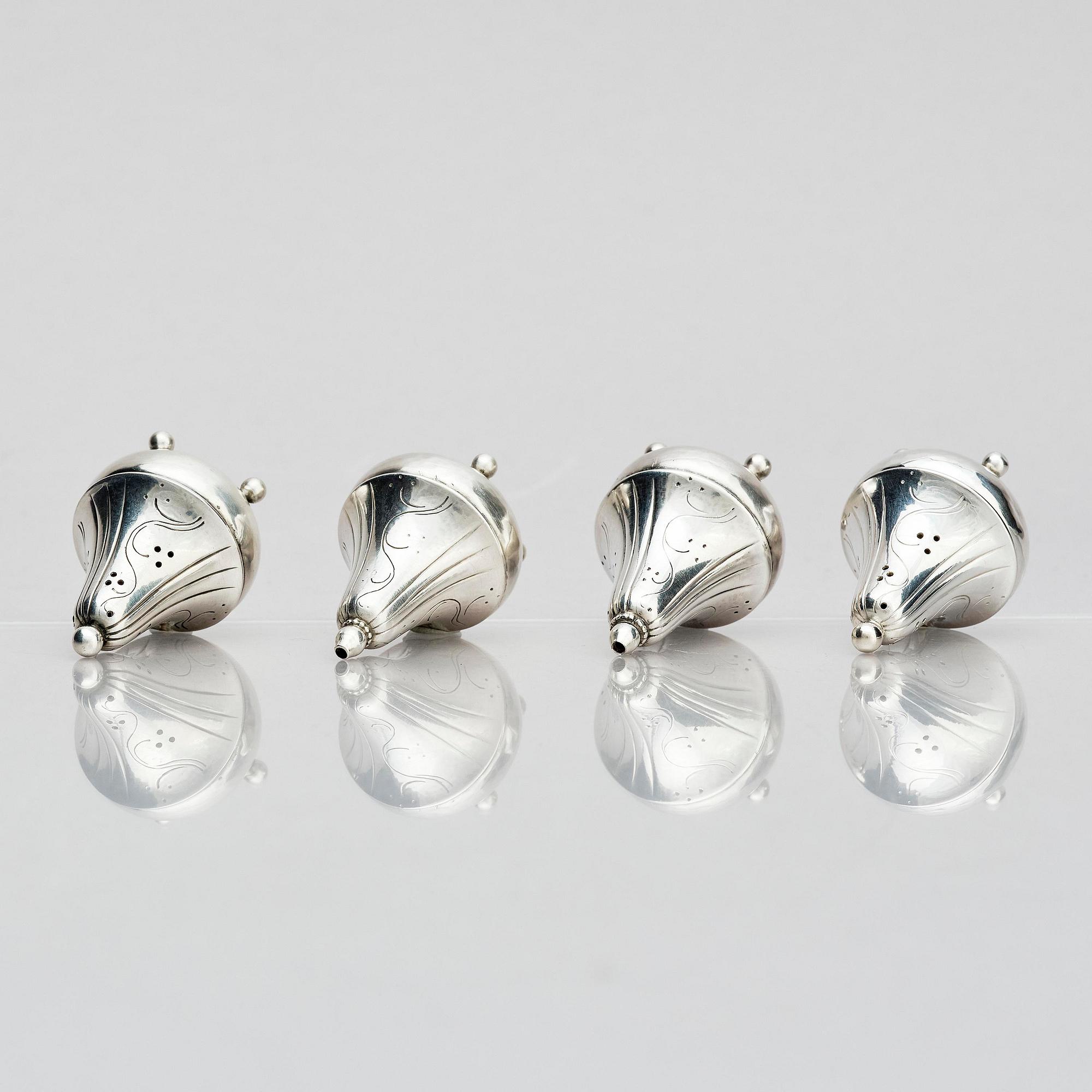 Georg Jensen, four sterling silver casters, design Harald Nilesen, Copenhagen 1933-44, one Copenhagen after 1945.