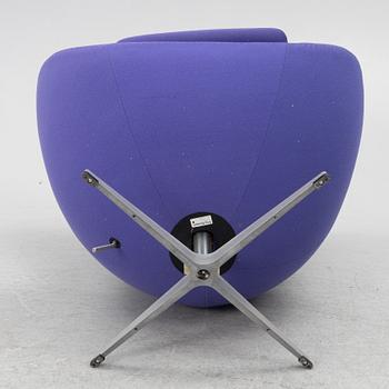 Arne Jacobsen, an armchair with footstool, "The Egg", Fritz Hansen, Denmark, 2003.