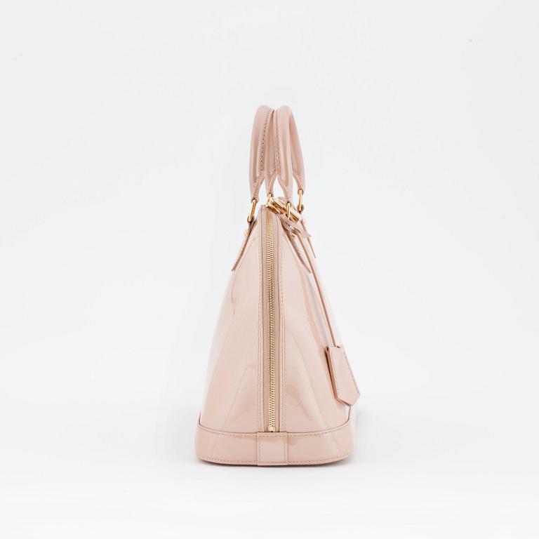 LOUIS VUITTON, a powder beige monogrammed vernis top handle bag, "Alma".