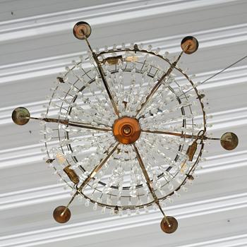 A late Gustavian gilt brass and cut glass seven-light chandelier, circa 1800.