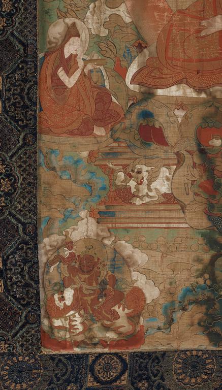 A finely painted Tibeto-Chinese thangka portraying Tsong Khapa, 18th/early 19th century.