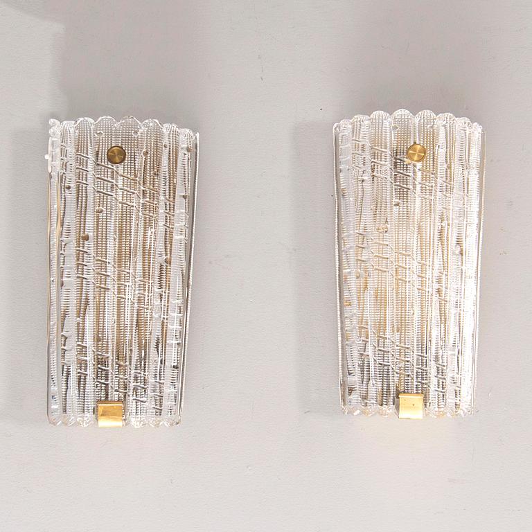 A pair of Carl Fagerlund wall scones from Orrefors later part of the 20th century.