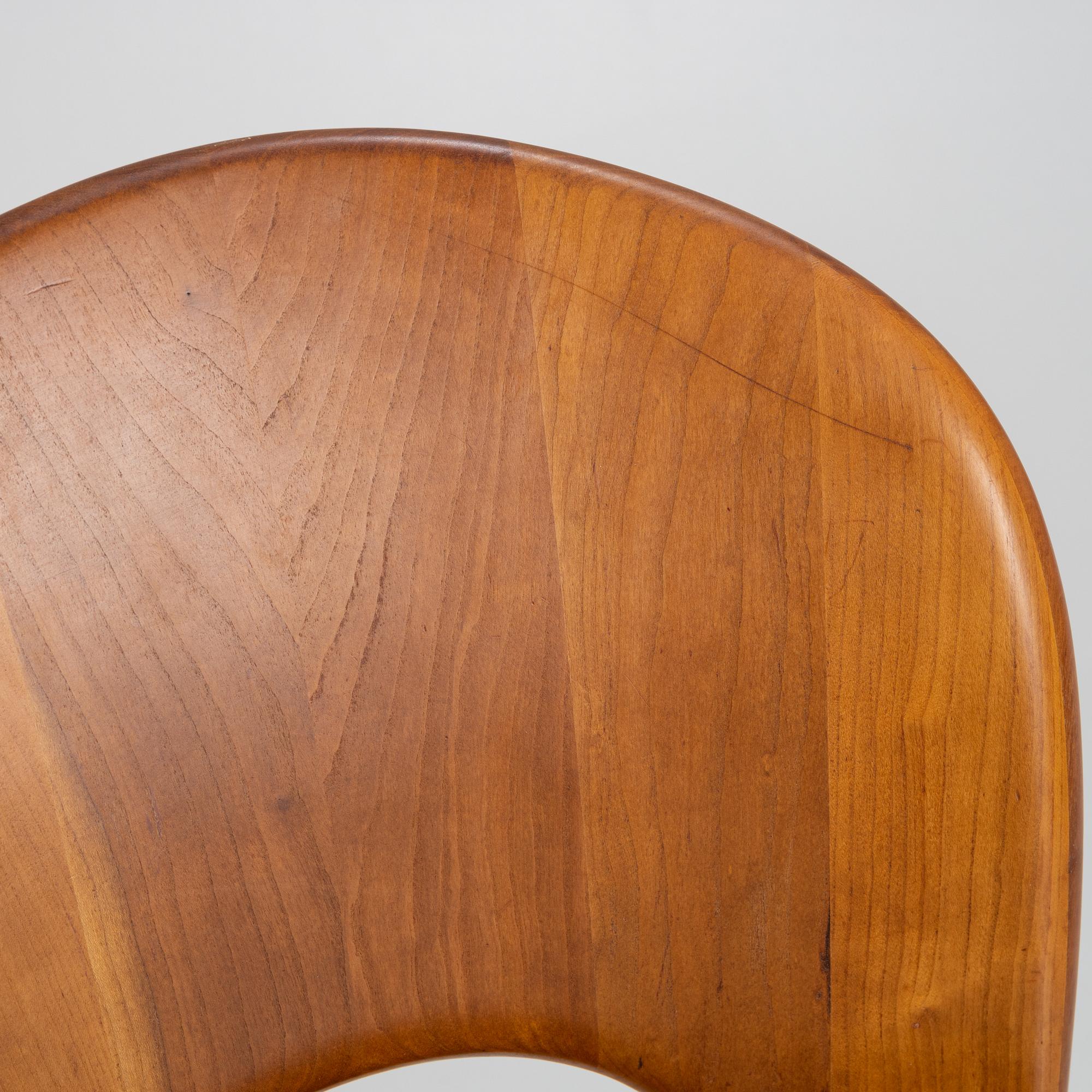 Niels Koefoed, eight teak dining chairs upholstered in new sheep skin, Denmark, 1960's.