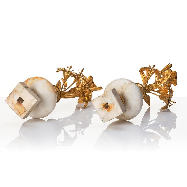 A pair of Louise Philippe candlesticks.