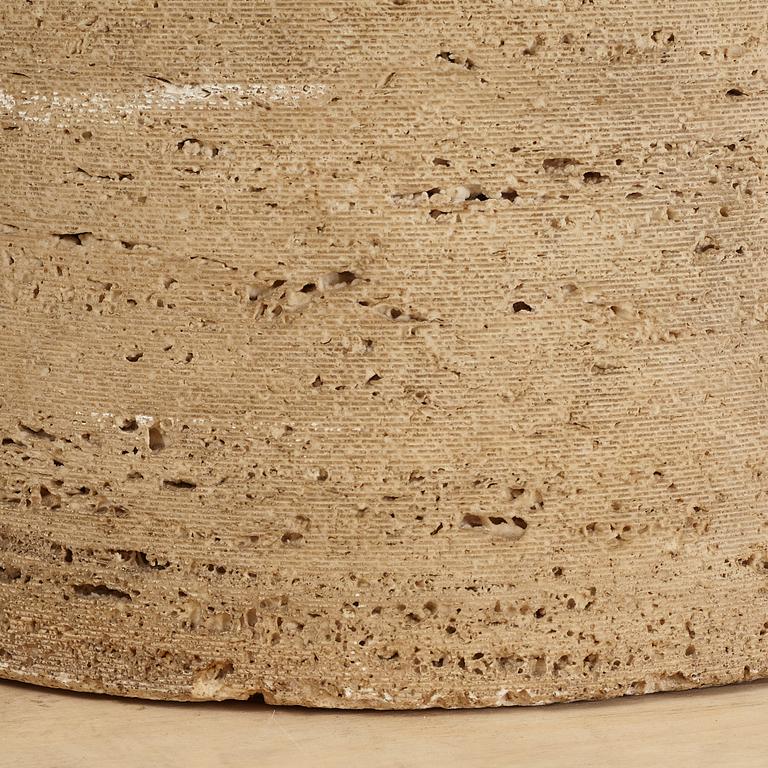 A travertine dining table, late 20th century.