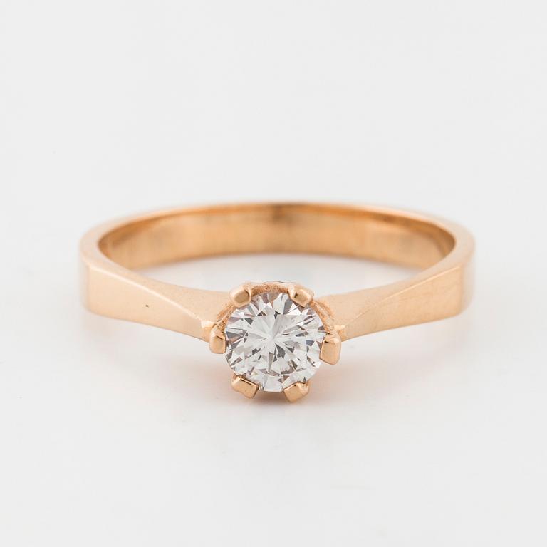 A brilliant cut diamond ring.