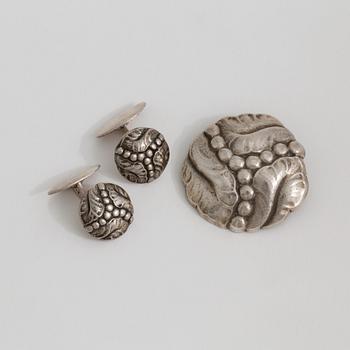 A brooch and a pair of cuff links by Georg Jensen, Danmark.