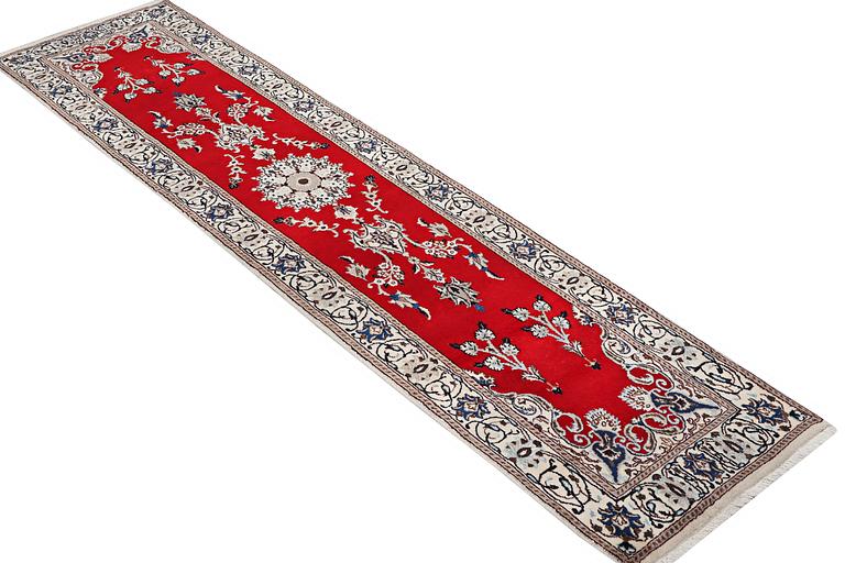 A runner carpet, Nain, part silk, 9 laa, c. 378 x 84 cm.