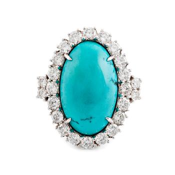 A turquoise and round brilliant cut diamond ring.