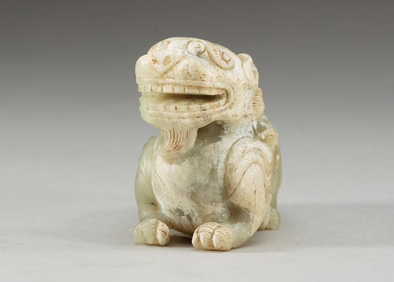 A nephrite figure of a 'Buddhist Lion', Qing dynasty or older.