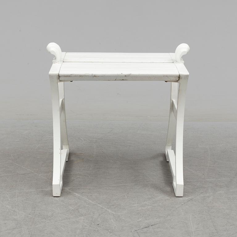 A "Sneckan" bench by Folke Bensow for Byarums bruk in the late 20th century.