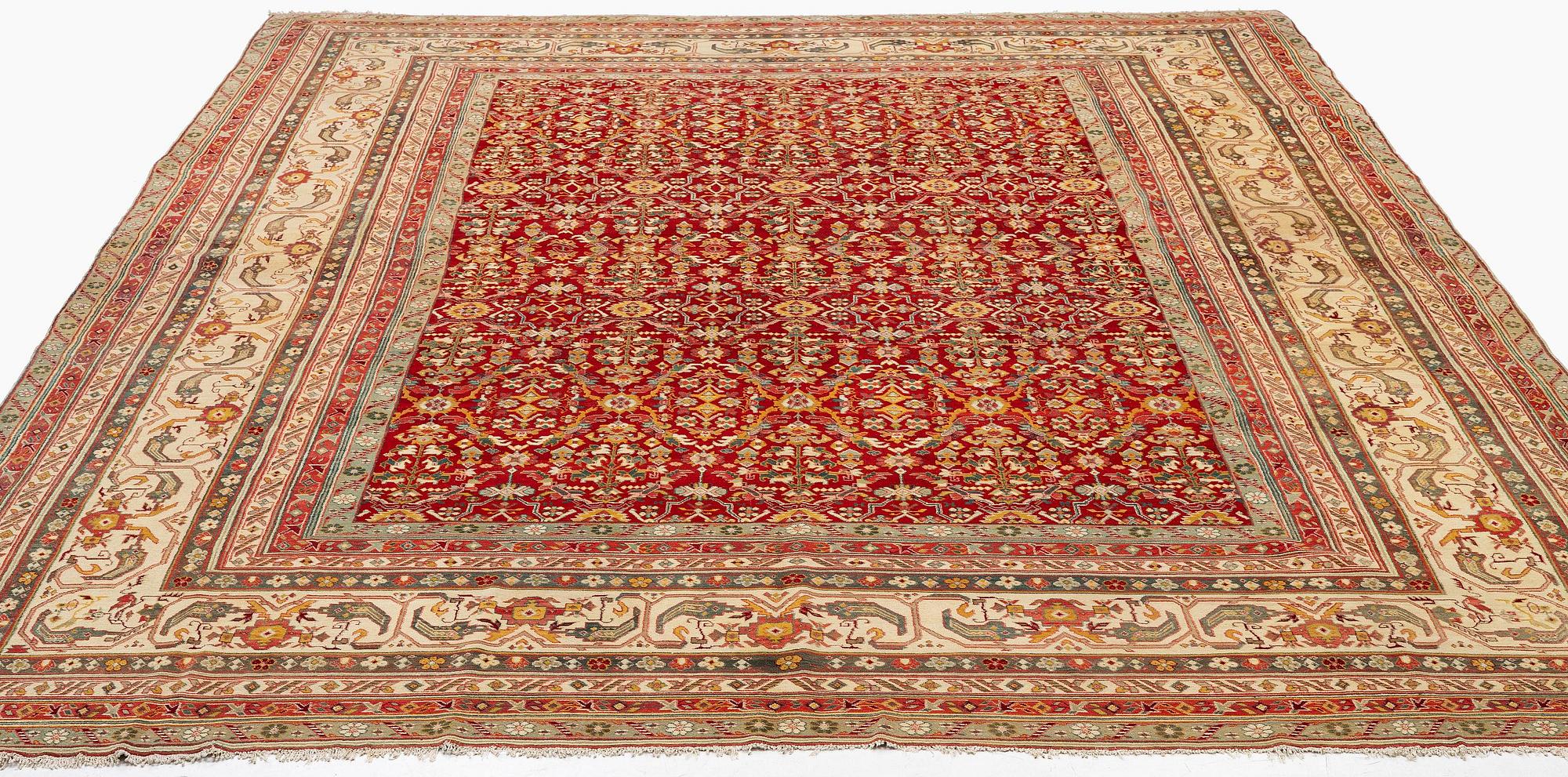 An antique Agra carpet, North India, c. 470 x 370 cm.