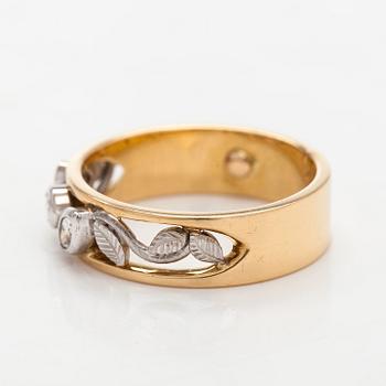 Sormus, briljantti- ja markiisihiontaiset timantit, 18K kultaa. Kultasarvi, Åbo 2003.