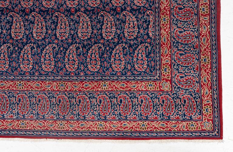 A semi-antique Qum rug, approx. 212 x 139 cm.