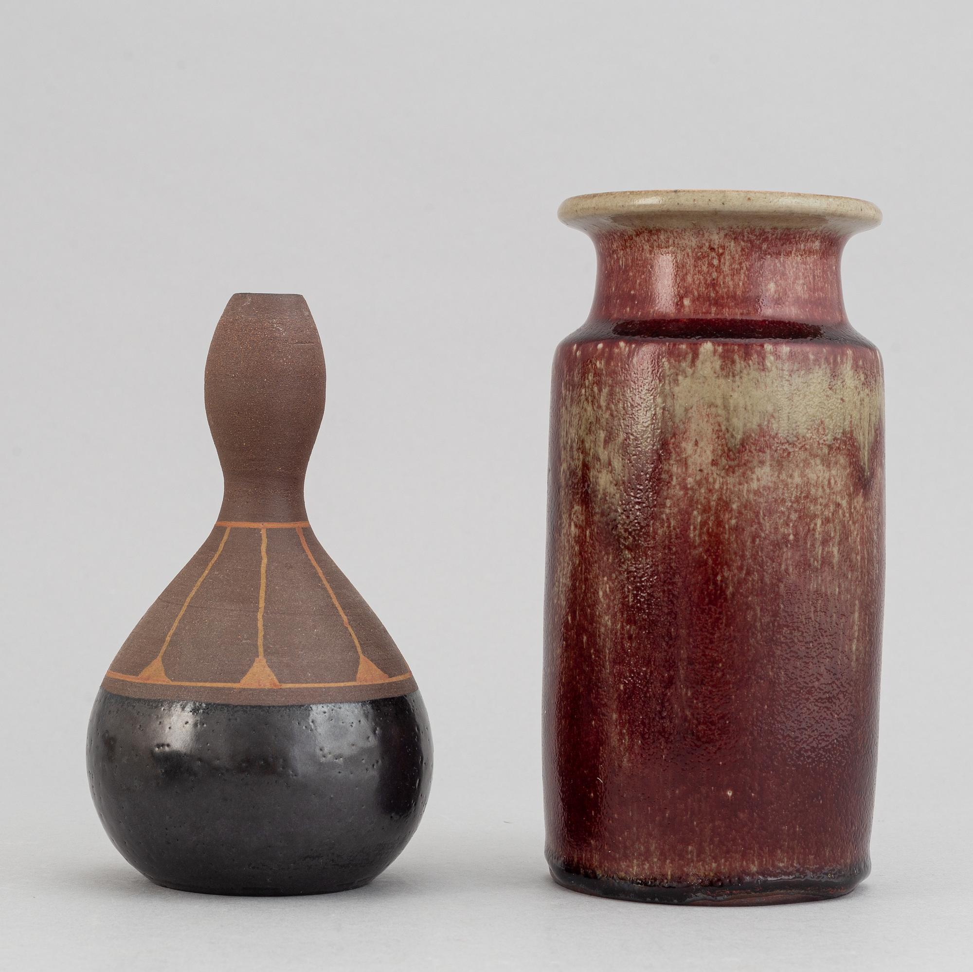 Rolf Palm, a set of two stoneware vases and three stoneware bowls.