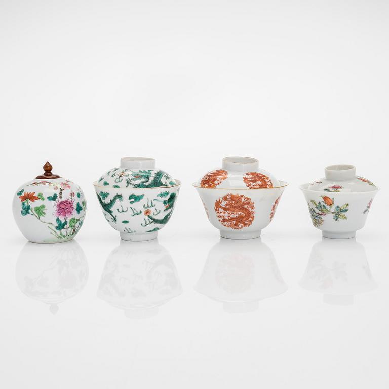 A set of seven bowls of which three with lids and a small famille rose jar, including Guangxu mark, China, circa 1900.