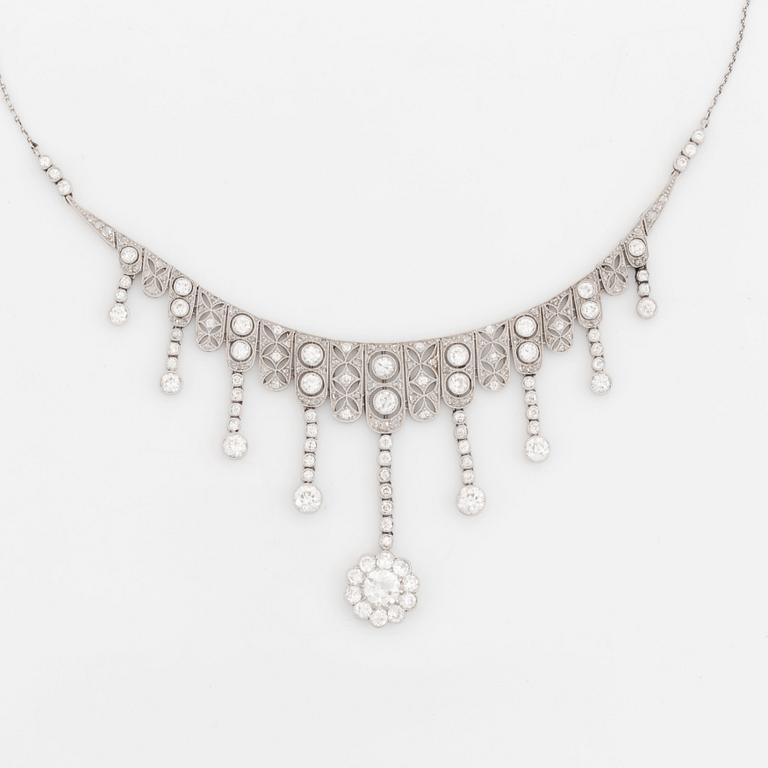 A platinum necklace set with old- and rose-cut diamonds.