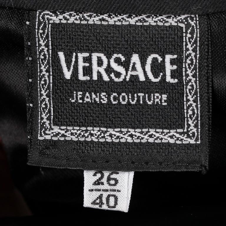 VERSACE, a black dress with lace.