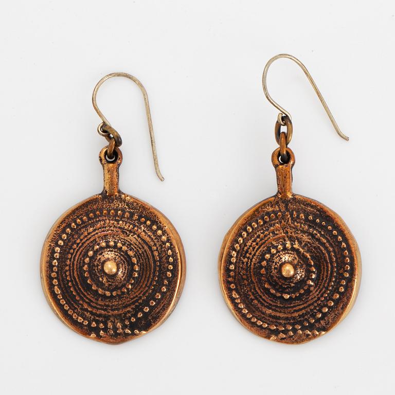 A pair of Jorma Laine earrings in bronze.