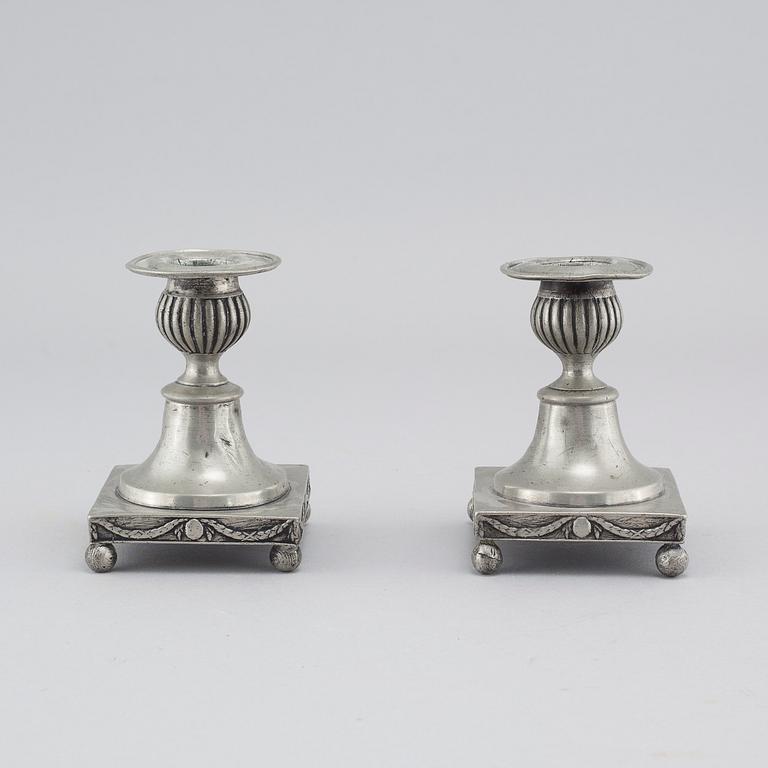 A pair of pewter candlesticks by Adolf Fredrik Moberg in Jönköping, 1824.